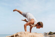 © Lucas Ottone/Stocksy - Skilled yoga practitioner