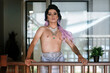 © J Esteban Berrío/Stocksy - Man dressed as a woman with naked torso