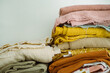 © Duet Postscriptum/Stocksy - Stacks of various fabrics for clothing
