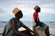 © Hugh Sitton/Stocksy - Portrait of two young men at the beach,  Zanzibar.