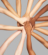 © Trinette Reed/Stocksy - Group of diverse women's hands connected together in inclusion