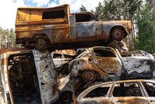 Cemetery Of Burnt Rusty Cars.