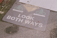 LOOK BOTH WAYS Sign On Sidewalk