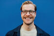© Studio Firma/Stocksy - Man with Glasses Smiling