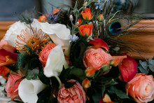 Colorful Bouquet With Peacock Feathers And Flowers