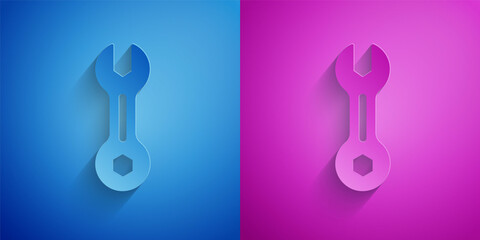 Canvas Print - Paper cut Wrench spanner icon isolated on blue and purple background. Paper art style. Vector