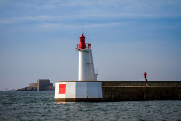 Wall Mural - Saint-Malo lighthouse and pier, Brittany, France