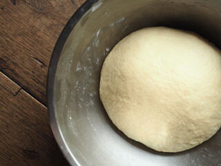 Wall Mural - bowl of rising bread dough