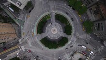 Aerial View Above Traffic Driving Around The Columbus Circle, In NYC, USA - Rotating, Top Down, Drone Shot