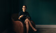 © Jacob Lund - Independent business woman holding a cup of coffee in an office