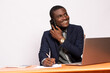 © Confidence - african business man making a phone call while working