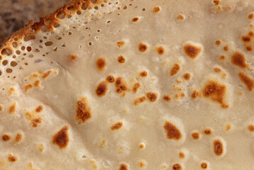 Poster - Pan fried pancake as a background.