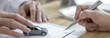 © Puwasit Inyavileart - Dealer or manager gives the car to the customers who sign the car purchase documents with insurance, Signing a contract to buy a car that is legal, Document signing and credit approval Concept.