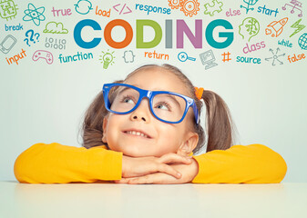 beautiful cute little girl with eyeglasses looking at colorful coding word, symbols and commands abo