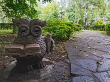 Statue Of An Owl With A Book. Parks Reading Books