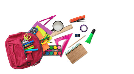 Wall Mural - Back to school. School supplies out of a student backpack isolated on white color, top view.