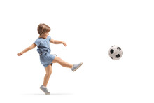 Full Length Shot Of A Little Girl Kicking A Football