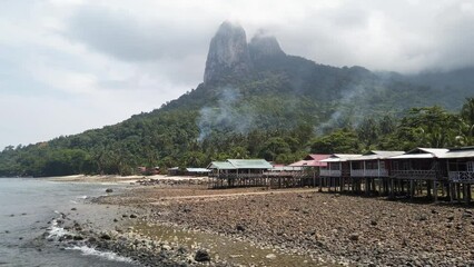 Canvas Print - Evening fog on the Dragon Horn Hill in Kampung Mukut, Tioman island , Malaysia