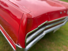 Closeup Of The Back Of A Red Vintage Car