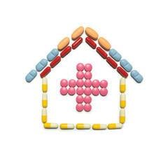 Wall Mural - Creative health concept photo of medicine signs hospital heart ambulance made of pills drugs.