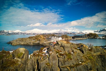 Wall Mural - scenic view of hamn i senja hotel in hamn, norway in cloudy sky background