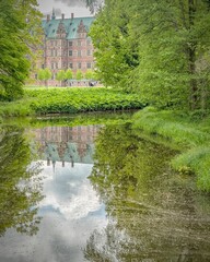 Poster - Scenic view of Frederiksborg Castle, Hillerod, Denmark, reflected in the lake