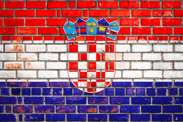 Wall Mural - National  flag of the Croatia  on a grunge brick background.