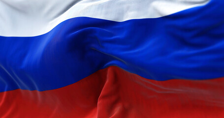 Close-up view of the Russian national flag waving in the wind