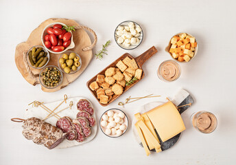 appetizers table with different antipasti, charcuterie, snacks, cheese. finger food for buffet party