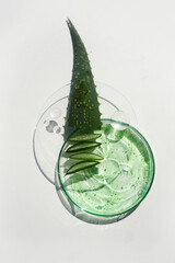 Abstract cosmetic laboratory. Aloe vera cosmetic product, natural ingredients and laboratory glassware.