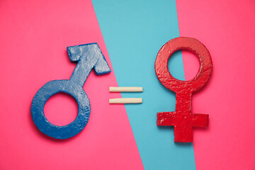 Wall Mural - Gender equality. Equal sign, male and female symbols on color background, flat lay