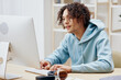 © SHOTPRIME STUDIO - portrait of a man sitting at a table in front of a computer freelance technologies