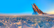 Beautiful winter landscape of frozen Lake Baikal at sunrise - A granite rock with steep slopes rises above a frozen lake - Baikal lake, Siberia