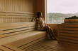 © BGStock72 - Young woman relaxing in the sauna
