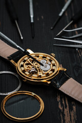 Mechanical watch repair. Watchmaker is repairing the mechanical watches