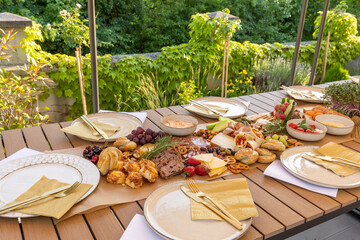 Food served outdoor on a long table