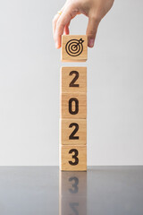 2023 block with dartboard sign. Business Goal, Target, Resolution, strategy, plan, Action motivation, mission, thinking, and New Year start concepts