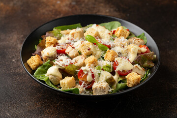 Wall Mural - Vegetarian ceasar salad with meat free chicken pieces cherry tomatoes croutons and lettuce