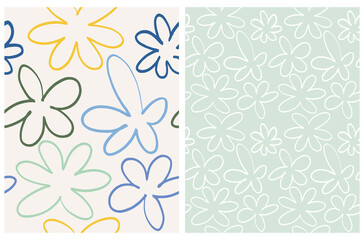 Wall Mural - simple hand drawn floral vector patterns. yellow and blue irregular shape flowers on a light mint bl