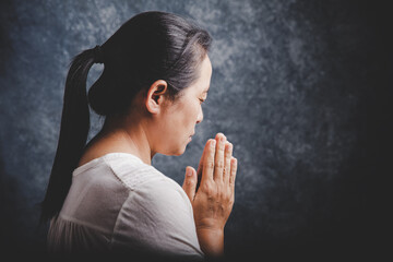 Woman Pray for god blessing to wishing have a better life