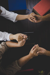 Wall Mural -  Group of people praying worship believe