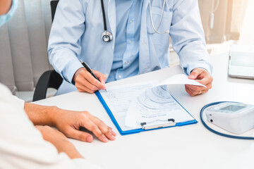 Wall Mural - Doctors and patients sit and talk to the patient about medication in the hospital.