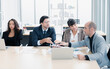 © Danai - Diversity business group of people working together in office, Business group in discussion meeting