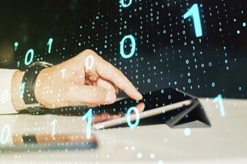 Wall Mural - double exposure of creative abstract binary code hologram and finger clicks on a digital tablet on b
