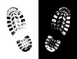 Shoeprints icon in black and white vector sign