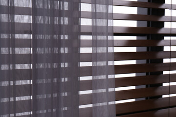 Canvas Print - Window with beautiful curtain and blinds, closeup