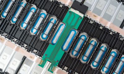 selective focus of electric car lithium battery pack and wiring connections internal between cells o