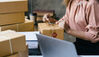 © PaeGAG - Starting small businesses SME owners female entrepreneurs check online orders to prepare to pack the boxes, sell to customers, sme business ideas online.