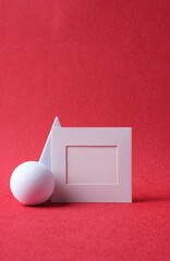 Poster - mockup blank paper frame with pedstall on red background
