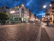 Poland, Warmian-Masurian Voivodeship, Elblag, Cobblestone Street In Old Town At Night